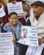Senior RJD leader Rabri Devi with party legislators stage a 'dharna' during the Budget session of the state assembly, in Patna, on Friday. RJD members demanded resignation of CM Nitish Kumar over his alleged ‘insult to the National Anthem’ during a sporting event on Thursday. (PTI) Senior RJD leader Rabri Devi with party legislators stage a 'dharna' during the Budget session of the state assembly, in Patna, on Friday. RJD members demanded resignation of CM Nitish Kumar over his alleged ‘insult to the National Anthem’ during a sporting event on Thursday. (PTI)