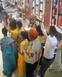 A group of men walked into a branch of Tanishq jewellery store in Bihar, overpowered the security guard and robbed the outlet of gold and silver pieces worth <span class='webrupee'>₹</span>25 crore. (Video grab) A group of men walked into a branch of Tanishq jewellery store in Bihar, overpowered the security guard and robbed the outlet of gold and silver pieces worth <span class='webrupee'>₹</span>25 crore. (Video grab)
