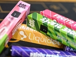 Disposable electronic cigarettes displayed on table at La Vapotitheque store in Bethune, northern France.(AFP) Disposable electronic cigarettes displayed on table at La Vapotitheque store in Bethune, northern France.(AFP)