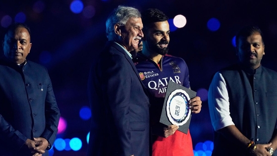 BCCI president Roger Binny felicitates Virat Kohli with an IPL 18 memento—one of a kind for a generational cricketer.(AP Image)