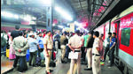 Police officers assess the situation at the station. (Arvind Yadav/HT Photo) Police officers assess the situation at the station. (Arvind Yadav/HT Photo)