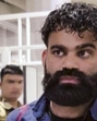 Gangster Jaggu Bhagwanpuria who was shifted from a Punjab jail to a prison in Silchar in Assam by the NCB on Sunday. (PTI) Gangster Jaggu Bhagwanpuria who was shifted from a Punjab jail to a prison in Silchar in Assam by the NCB on Sunday. (PTI)