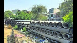 Water pipes, purchased in 2021 under the Smart City Mission, lying on the Ramleela ground near mandir situated in Sarabha Nagar area in Ludhiana on Tuesday. (Gurpreet Singh/Hindustan Times) Water pipes, purchased in 2021 under the Smart City Mission, lying on the Ramleela ground near mandir situated in Sarabha Nagar area in Ludhiana on Tuesday. (Gurpreet Singh/Hindustan Times)
