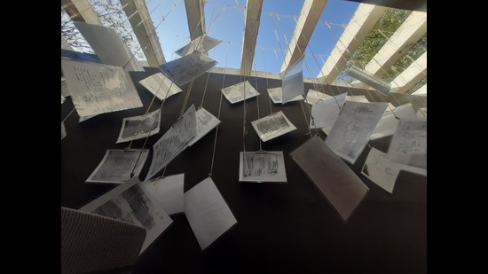 An installation created from permits that used to be issued to pastoralist communities to graze their cattle in the forest. (Charumathi Supraja) An installation created from permits that used to be issued to pastoralist communities to graze their cattle in the forest. (Charumathi Supraja)
