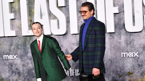 Chilean-US actor Pedro Pascal (R) and British actor Bella Ramsey attend the premiere of HBO's "The Last of Us", Season 2, at the TCL Chinese theatre in Hollywood, California, March 24, 2025. (Photo by Chris DELMAS / AFP)(AFP)
