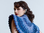 The actor looks breathtaking in a Nature-inspired ensemble featuring a drape gown with peacock feather motifs, adorned with sequins, and enhanded with structured shoulders, and cut out details at the waist. Her look is further elevated by Zambian emerald cascade diamond ear cuffs and statement diamond earrings. The actor looks breathtaking in a Nature-inspired ensemble featuring a drape gown with peacock feather motifs, adorned with sequins, and enhanded with structured shoulders, and cut out details at the waist. Her look is further elevated by Zambian emerald cascade diamond ear cuffs and statement diamond earrings.