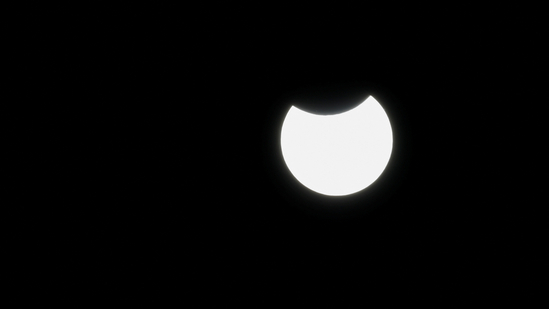 A partial solar eclipse is seen above Ronda, Spain, March 29, 2025. REUTERS/Jon Nazca