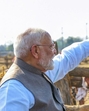 Prime Minister Narendra Modi greets supporters upon his arrival during the foundation stone laying and inauguration of multiple development projects, in Bilaspur, Chhattisgarh, on Sunday. (PMO) Prime Minister Narendra Modi greets supporters upon his arrival during the foundation stone laying and inauguration of multiple development projects, in Bilaspur, Chhattisgarh, on Sunday. (PMO)