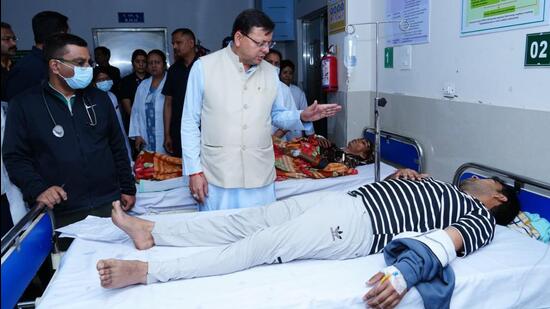CM Pushkar Dhami meets the patients at Coronation hospital. (HT Photo) CM Pushkar Dhami meets the patients at Coronation hospital. (HT Photo)