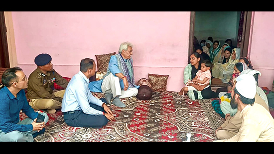 Jammu and Kashmir lieutenant governor Manoj Sinha meets the family members of a police personnel who dies during the Kathua anti-terrorist operation, on Monday. (Photo: Office of LG J&K-X) Jammu and Kashmir lieutenant governor Manoj Sinha meets the family members of a police personnel who dies during the Kathua anti-terrorist operation, on Monday. (Photo: Office of LG J&K-X)