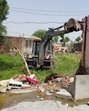 In a joint drive, the Kapurthala civil and police administration demolished three illegal structures owned by drug smugglers in Boot village of the district on Tuesday. (HT Photo) In a joint drive, the Kapurthala civil and police administration demolished three illegal structures owned by drug smugglers in Boot village of the district on Tuesday. (HT Photo)