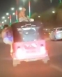 A screengrab from a video shows the men performing the stunts on the pink autorickshaw. (HT Photo) A screengrab from a video shows the men performing the stunts on the pink autorickshaw. (HT Photo)