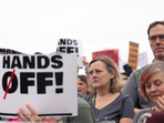 Demonstrators rally against U.S. President Donald Trump and his adviser Elon Musk (REUTERS)