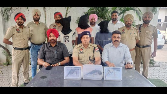 The accused in police custody along with recovered illegal weapons in Ludhiana on Saturday. (HT Photo) The accused in police custody along with recovered illegal weapons in Ludhiana on Saturday. (HT Photo)