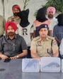 The accused in police custody along with recovered illegal weapons in Ludhiana on Saturday. (HT Photo) The accused in police custody along with recovered illegal weapons in Ludhiana on Saturday. (HT Photo)