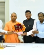 MLA from Agra GS Dharmesh and organising committee member of Bhim Nagari organising central committee meeting CM Aditya Nath at Lucknow on Monday. (HT) MLA from Agra GS Dharmesh and organising committee member of Bhim Nagari organising central committee meeting CM Aditya Nath at Lucknow on Monday. (HT)