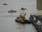 A crane vessel arrives at the scene where a helicopter crashed into the Hudson River, Thursday, April 10, 2025, in Jersey City, N.J. (AP Photo/Seth Wenig)(AP) A crane vessel arrives at the scene where a helicopter crashed into the Hudson River, Thursday, April 10, 2025, in Jersey City, N.J. (AP Photo/Seth Wenig)(AP)