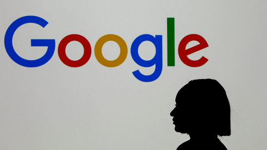 A woman stands in front of a Google logo during a media reception at the Google France headquarters ahead of the Artificial Intelligence Action Summit in Paris, France, February 9, 2025.(Gonzalo Fuentes/Reuters)
