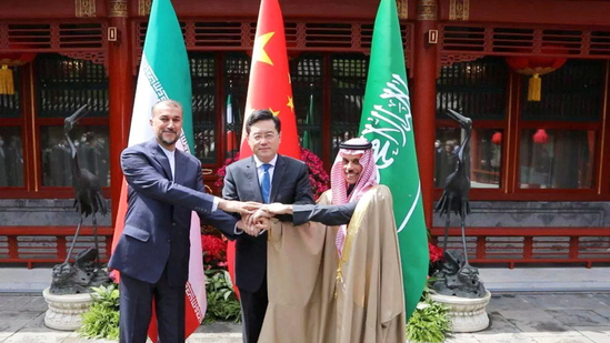 Iranian Foreign Minister Hossein Amir-Abdollahian and Saudi Arabia's Foreign Minister Prince Faisal bin Farhan Al Saud and Chinese Foreign Minister Qin Gang shake hands during a meeting in Beijing, China, April 6, 2023. Iran's Foreign Ministry/WANA (West Asia News Agency)/Handout via REUTERS (via REUTERS)