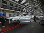 Employees work on an electric vehicle (EV) production line
in eastern China's Zhejiang province on September 18, 2024.
(Photo by Adek BERRY / AFP)(AFP) Employees work on an electric vehicle (EV) production line
in eastern China's Zhejiang province on September 18, 2024.
(Photo by Adek BERRY / AFP)(AFP)