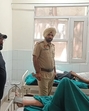 Two accused, caught after an encounter, being treated at a hospital in Ludhiana. (HT Photo) Two accused, caught after an encounter, being treated at a hospital in Ludhiana. (HT Photo)