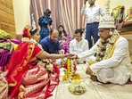 BJP leader Dilip Ghosh and Rinku Majumdar during their marriage, in Kolkata, Friday.(PTI) BJP leader Dilip Ghosh and Rinku Majumdar during their marriage, in Kolkata, Friday.(PTI)