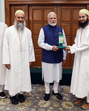 Prime Minister Narendra Modi being felicitated by a delegation from the Dawoodi Bohra community, in New Delhi on Thursday. (ANI PHOTO) Prime Minister Narendra Modi being felicitated by a delegation from the Dawoodi Bohra community, in New Delhi on Thursday. (ANI PHOTO)