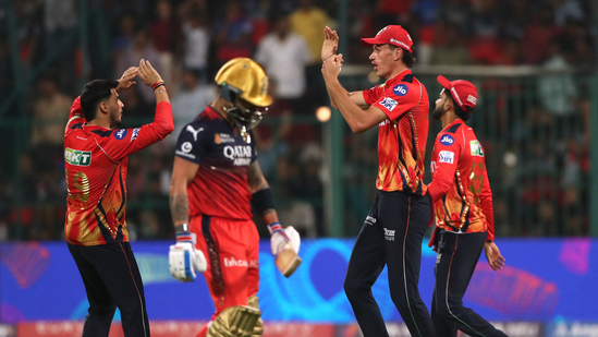 Punjab Kings' Marco Jansen celebrates with teammates after taking a catch to dismiss Royal Challengers Bengaluru's Virat Kohli (REUTERS)