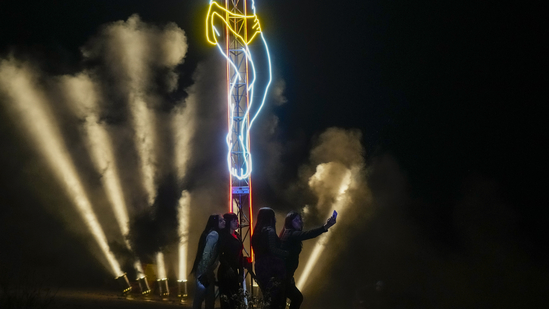 Chile: An illuminated neon sign of Jesus Christ stood out brightly in Colina, Chile, on Good Friday, April 18, 2025, following a Way of the Cross reenactment. The vibrant neon light added a modern touch to the traditional Holy Week celebrations. (AP Photo/Esteban Felix)(AP)