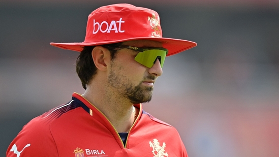 Tim David warms-up before the start of the Indian Premier League (IPL) Twenty20 cricket match between Punjab Kings and Royal Challengers Bengaluru(AFP) Tim David warms-up before the start of the Indian Premier League (IPL) Twenty20 cricket match between Punjab Kings and Royal Challengers Bengaluru(AFP)