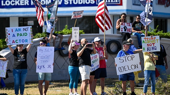 Demonstrators rally against Trump and join forces during a protest organised by the 50501 Movement on April 19, 2025, in Cocoa, Florida. (Getty Images via AFP)