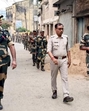 Security personnel keep vigilin Murshidabad on Sunday. (PTI) Security personnel keep vigilin Murshidabad on Sunday. (PTI)