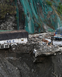 Vehicles buried under the debris on Srinagar-Jammu national highway after a cloudbursts at Ramban. (Waseem Andrabi /HT) Vehicles buried under the debris on Srinagar-Jammu national highway after a cloudbursts at Ramban. (Waseem Andrabi /HT)