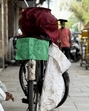 Shiv Shankar beside his bicycle. Shiv Shankar beside his bicycle.