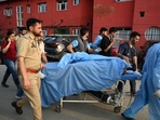 Paramedics carry an injured tourist at a hospital in Anantnag south of Srinagar, on April 22.(Waseem Andrabi /Hindustan Times) Paramedics carry an injured tourist at a hospital in Anantnag south of Srinagar, on April 22.(Waseem Andrabi /Hindustan Times)