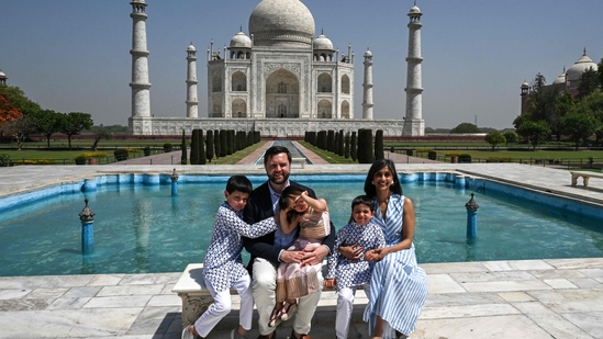 TOPSHOT - US Vice President JD Vance, his wife Usha Vance, daughter Mirabel and sons Ewan (L) and Vivek pose during their tour at the Taj Mahal in Agra on April 23, 2025. Vance said on April 22 that "good progress" had been made towards a trade deal with India after meeting with "tough negotiator" Prime Minister Narendra Modi in New Delhi. (Photo by Kenny HOLSTON / POOL / AFP)(AFP)
