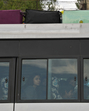 Tourists sit in tempo as they head towards the airport, following a suspected militant attack near south Kashmir's Pahalgam, in Srinagar. (REUTERS) Tourists sit in tempo as they head towards the airport, following a suspected militant attack near south Kashmir's Pahalgam, in Srinagar. (REUTERS)