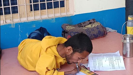 Nandram says it was not easy to begin writing by using his lips. (HT) Nandram says it was not easy to begin writing by using his lips. (HT)