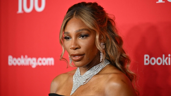 The tennis superstar looked like Hollywood royalty in black with her mesh elbow-length gloves. Serena Williams' all-black look was complemented by diamond jewellery, adding to her sparkle.(AFP)