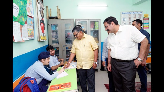 Punjab governor and Chandigarh administrator Gulab Chand Kataria interacting with students with special needs at PM Shri GMSSS Dhanas on Saturday. (HT Photo)