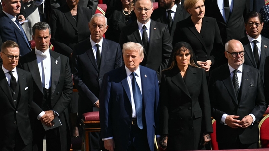 US President Donald Trump (C) and First Lady Melania Trump (C/R) stand alongside leaders including France's President Emmanuel Macron (L) and Finland's President Alexander Stubb (2L) as they attend the late Pope Francis' funeral ceremony at St Peter's Square at the Vatican on April 26, 2025.(AFP)
