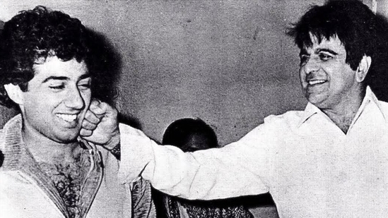 Dilip Kumar playfully interacts with Sunny Deol. Dilip Kumar playfully interacts with Sunny Deol.