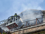 Firefighters try to douse the fire that broke out at Enforcement Directorate (ED) Office, Ballard Pier, in Mumbai on Sunday.(ANI Photo) Firefighters try to douse the fire that broke out at Enforcement Directorate (ED) Office, Ballard Pier, in Mumbai on Sunday.(ANI Photo)