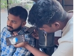 A young Bengaluru man uses AI to fix an auto price in Bengaluru. A young Bengaluru man uses AI to fix an auto price in Bengaluru.