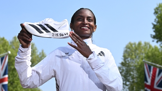 Ethiopia's Tigst Assefa poses for a picture after crossing the line to win the women's race at the 2025 London Marathon in central London on April 27, 2025.&nbsp;(AFP)