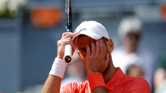 Serbia's Novak Djokovic reacts during his round of 64 match against Italy's Matteo Arnaldi (REUTERS)