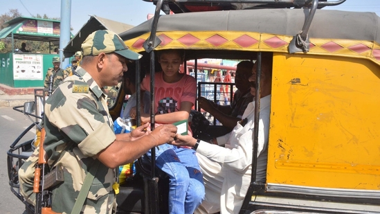 A Pakistani national shows travel documents at Attari-Wagah border after India revoked visas. India suspended visa services to Pakistani nationals 'with immediate effect' following a terror attack in Pahalgam that resulted in the death of 27. (Sameer Sehgal/HT)