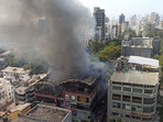 A civic official said the fire broke in the building’s basement but later spread to the upper floors, which were soon filled with smoke.(Satish Bate/ Hindustan Times) A civic official said the fire broke in the building’s basement but later spread to the upper floors, which were soon filled with smoke.(Satish Bate/ Hindustan Times)