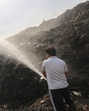 Fire officials continue to douse the fire, a day after it started at a waste treatment plant near Bandhwari. (Parveen Kumar/HT Photo) Fire officials continue to douse the fire, a day after it started at a waste treatment plant near Bandhwari. (Parveen Kumar/HT Photo)