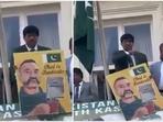 Pak's Colonel Taimur Rahat was also spotted holding a poster featuring a sketch of IAF pilot Captain Abhinandan Varthaman. (X) Pak's Colonel Taimur Rahat was also spotted holding a poster featuring a sketch of IAF pilot Captain Abhinandan Varthaman. (X)